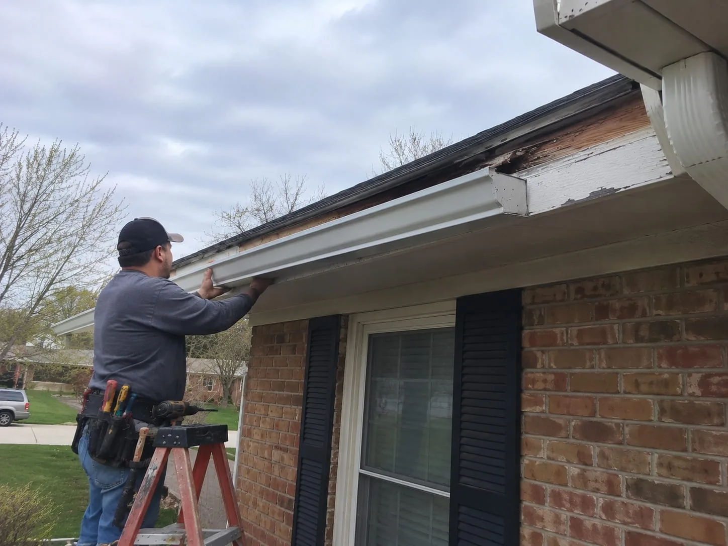 Gutter being repaired and resealed on an Auckland home