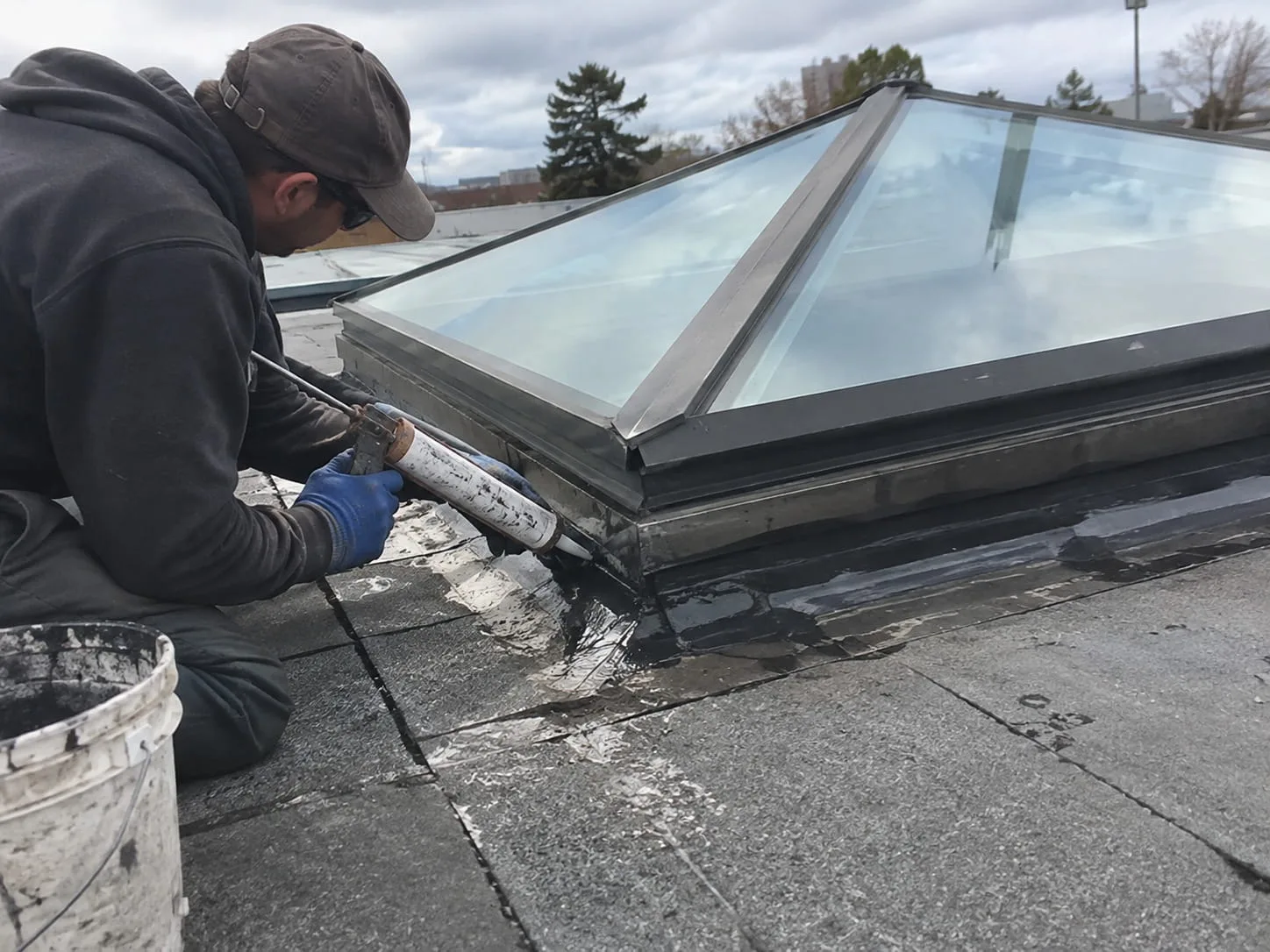 Roof leak repair underway on a West Auckland home