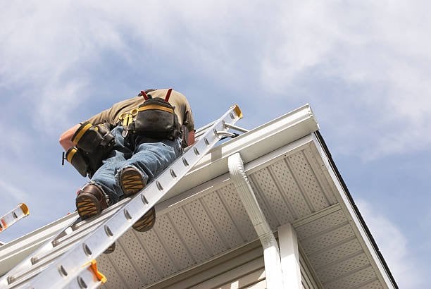 Roof edge and gutter inspection from a ladder